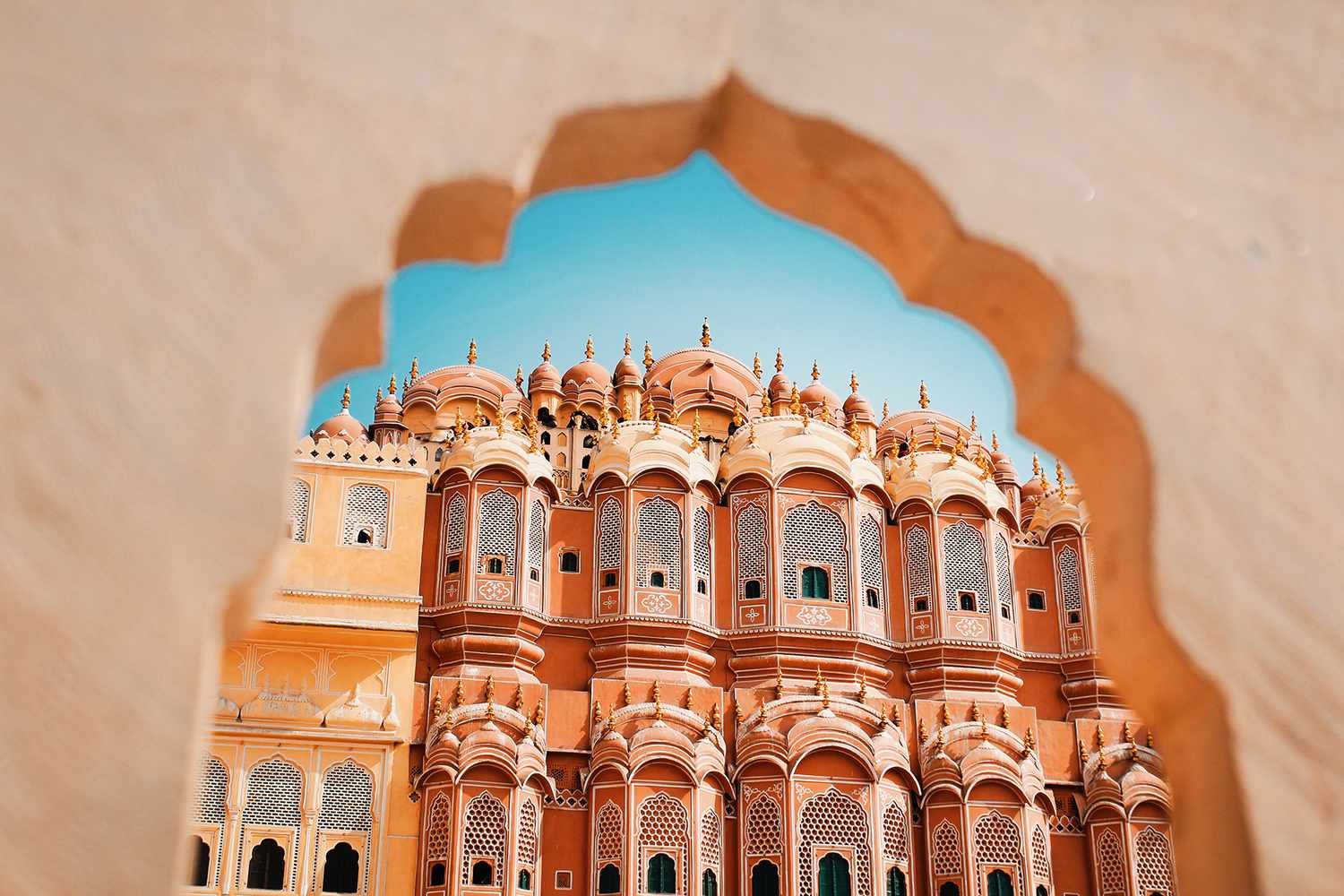 The pink sandstone windows of the Hawa Mahal in Jaipur