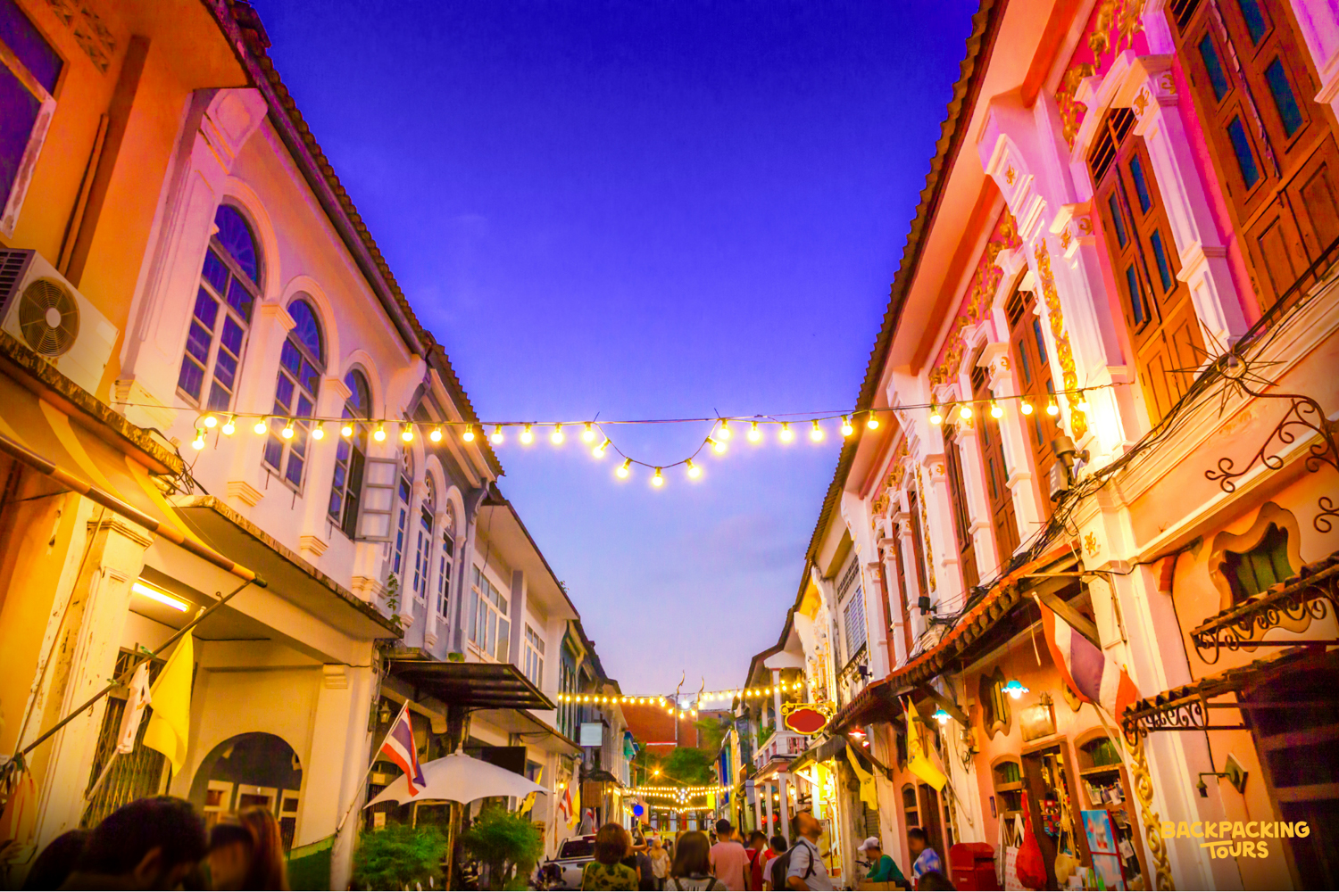 Colorful streets of Phuket Old Town with colonial architecture explored during the backpacking tour