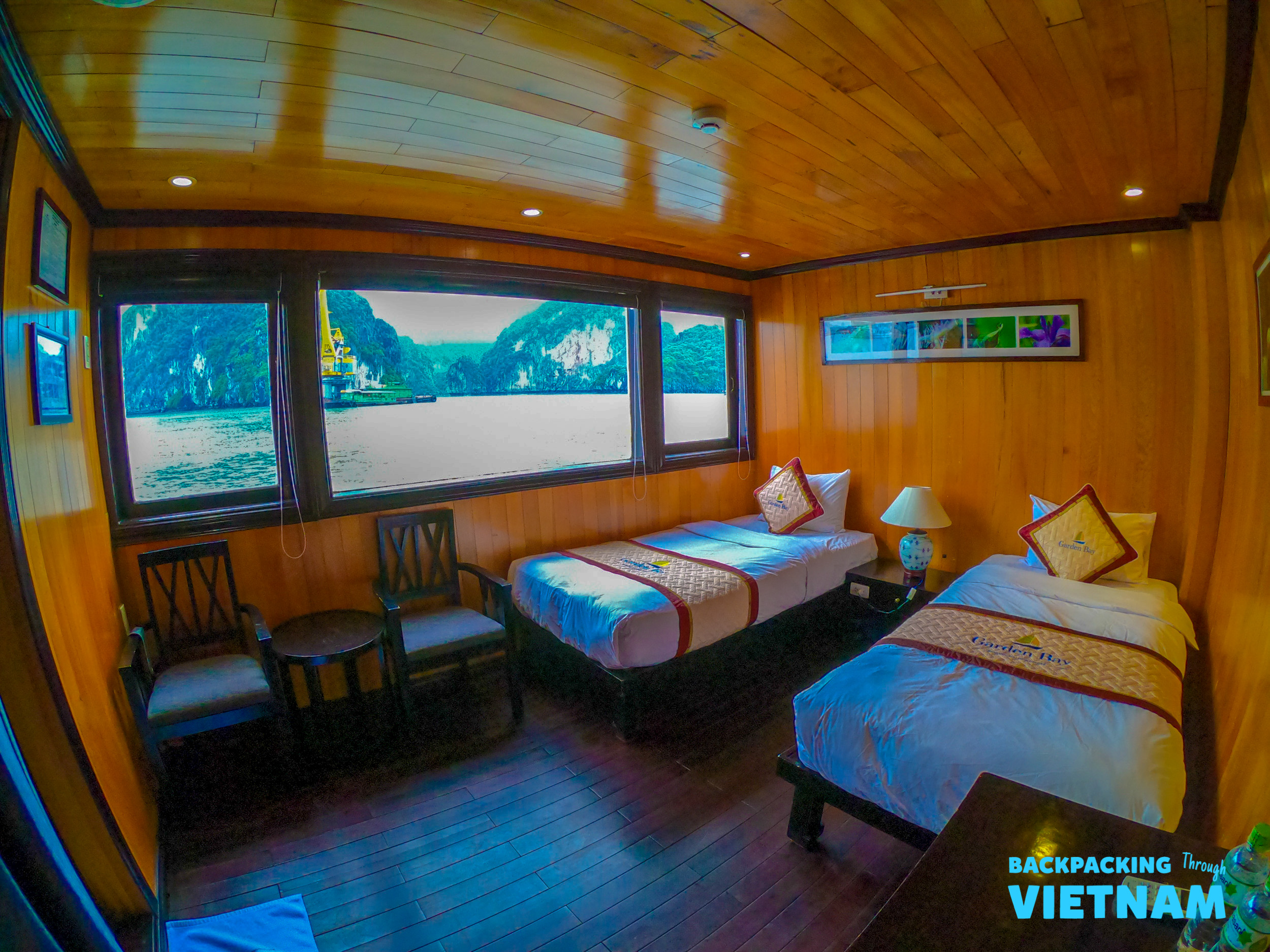 A comfortable twin cabin on a Halong Bay sleeper boat with stunning views of the bay.