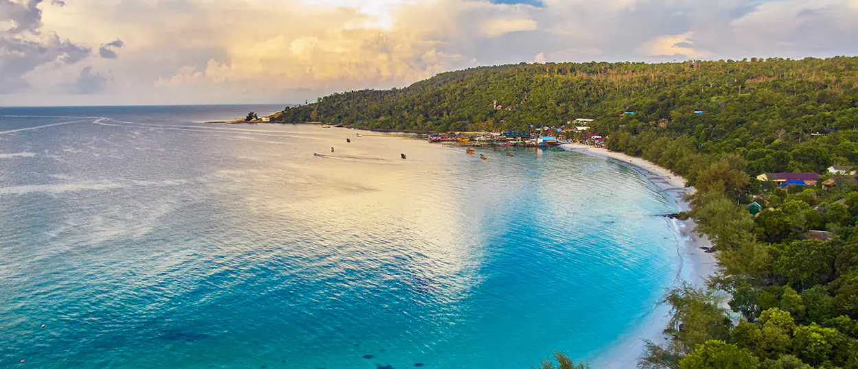 Stunning aerial view of a tropical bay with turquoise water and sandy beach on Koh Rong.