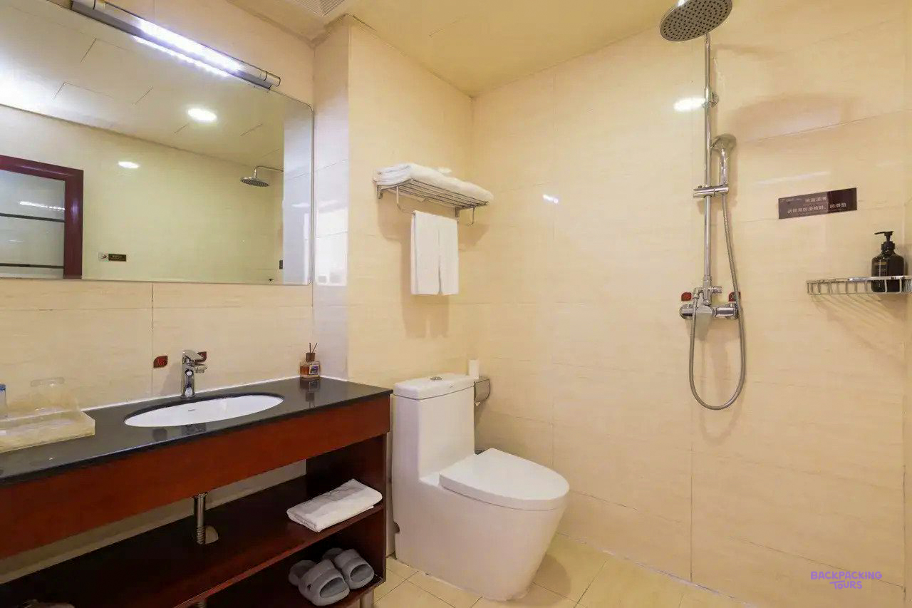 The bathroom of the hotel in Beijing, with a walk-in shower