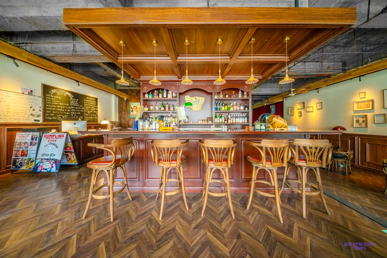 The wooden bar with high stools at the accommodation in Chengdu