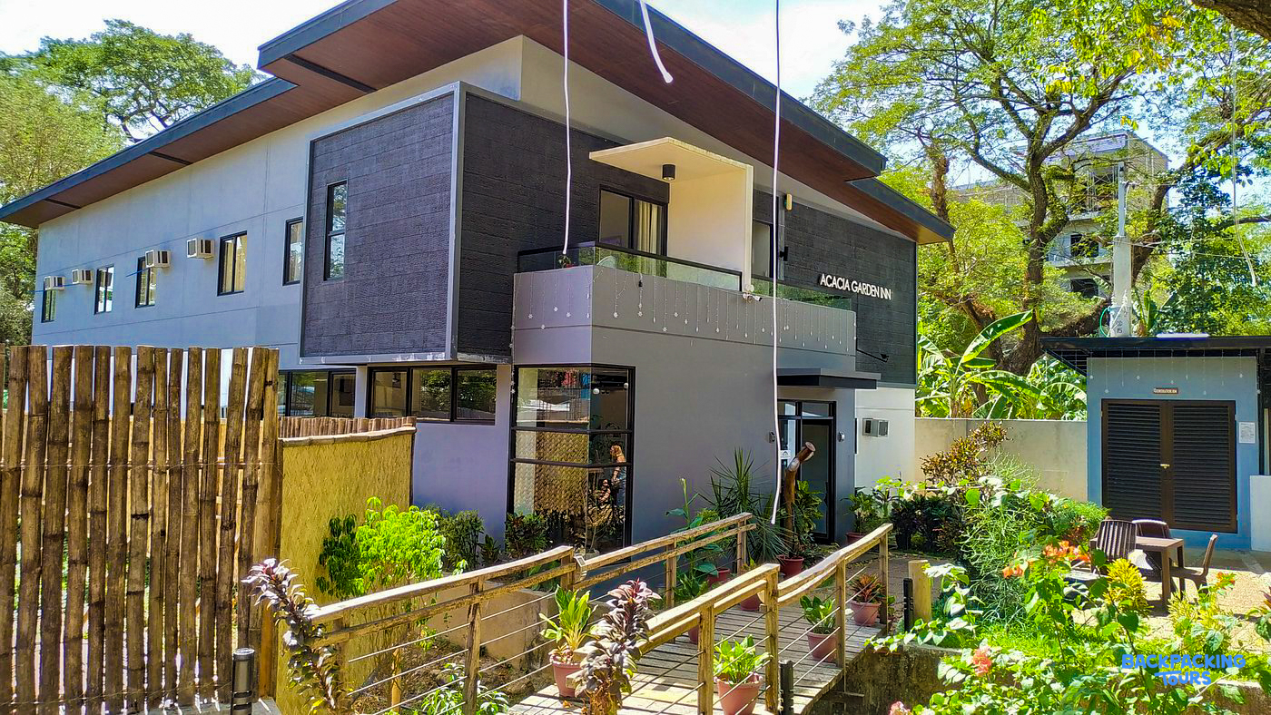 The welcoming Acacia Garden Inn in Coron, featuring a modern design and beautiful tropical garden.